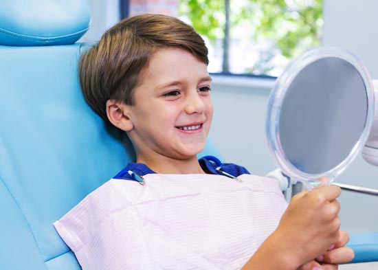 bambino dal dentista